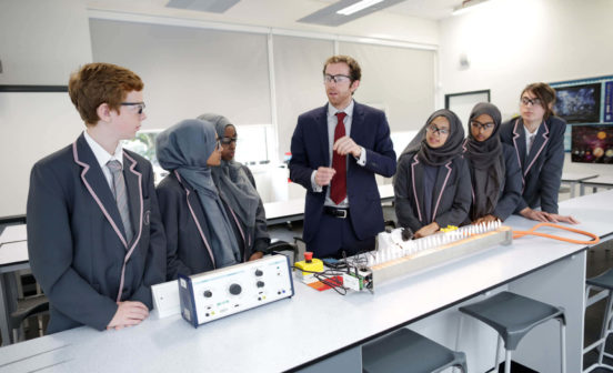 teacher with school students