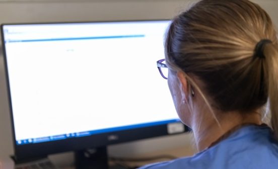 Staff using computer